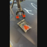 DentPDR Sergio Pillon square tabs applied to a vehicle dent