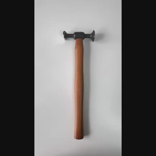 DentPDR Model 12 steel hammer used on a vehicle panel