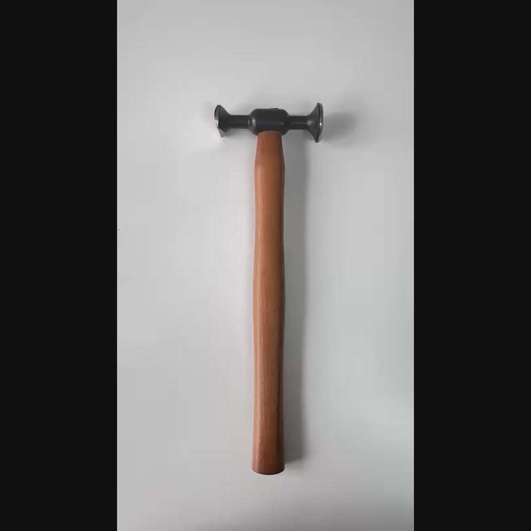 DentPDR Model 12 steel hammer used on a vehicle panel