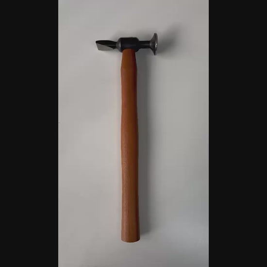 PDR technician using the Model 11 auto body hammer