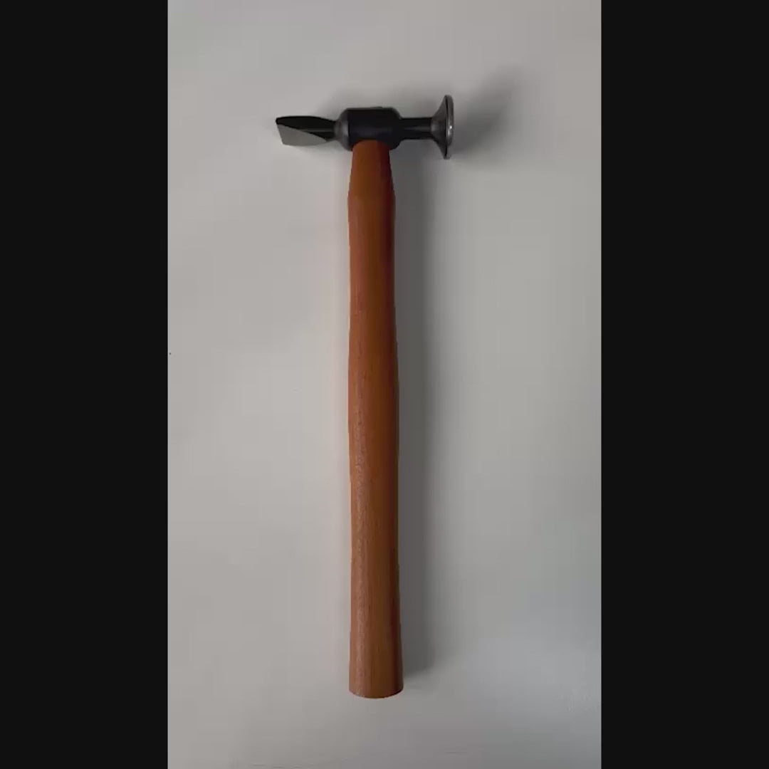 PDR technician using the Model 11 auto body hammer