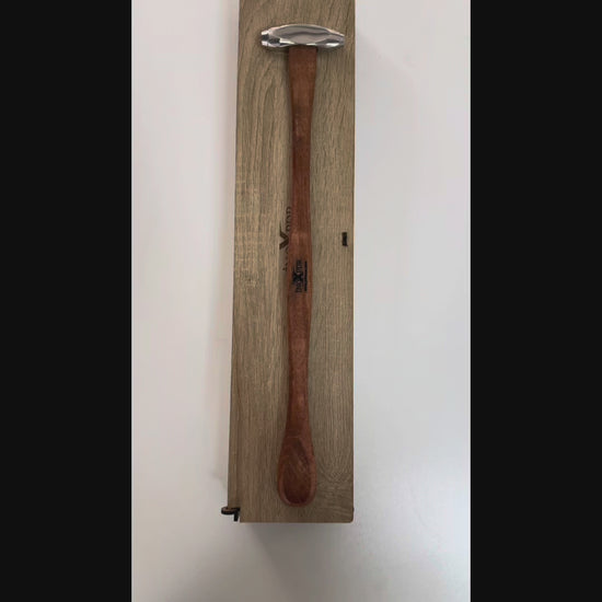 Auto body professional blending a panel with the 170g hammer