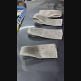 Professional paintless dent repair technician using the heavy-duty tensioning rope system during a high-tonnage panel pulling process.