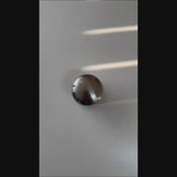 Close-up of the domed knob profile on the DentPDR backing tool