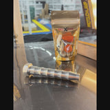 Professional PDR technician leveling a crown with the aluminum pen